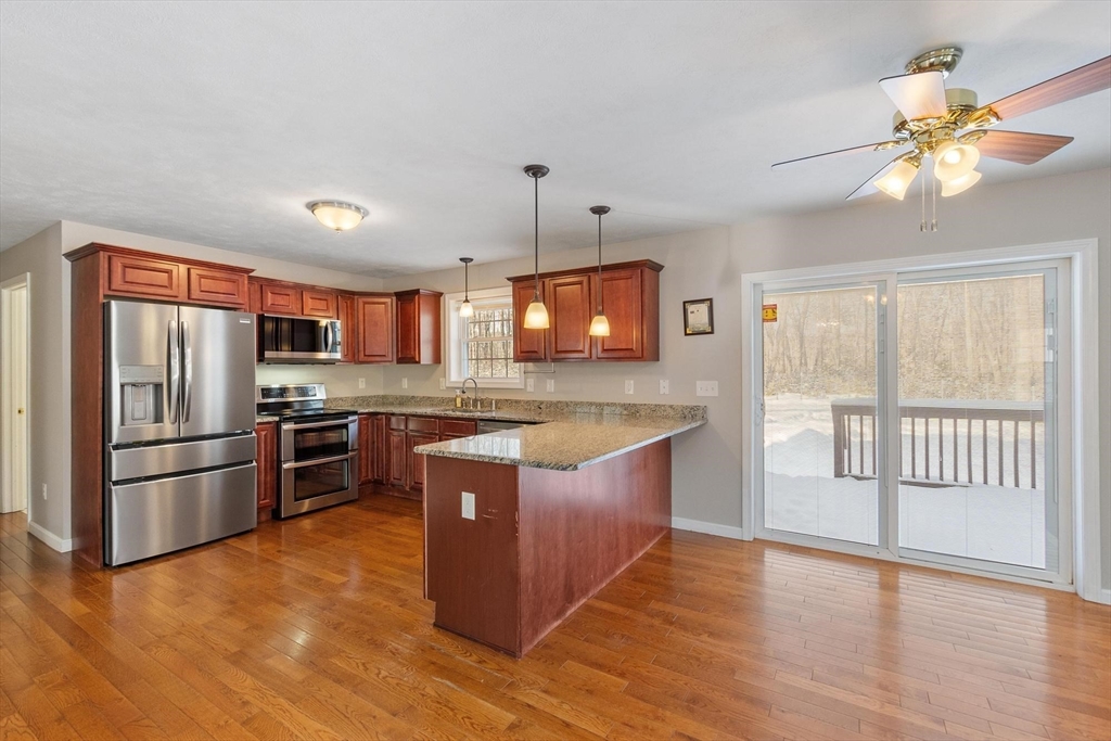 210 Bean Porridge Hill Road Westminster, MA 01473 - Photo 5 of 39 a kitchen with stainless steel appliances granite countertop a refrigerator a stove a sink and a refrigerator