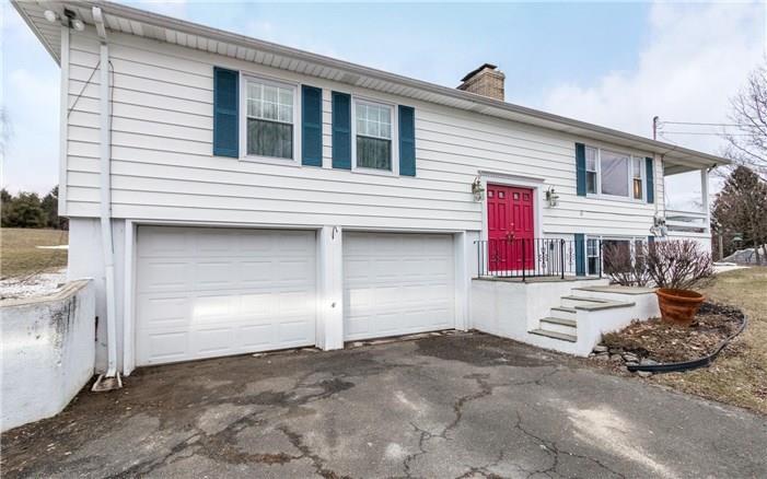 28 Williams Road New Fairfield, CT 06812 - Photo 1 of 1 a front view of a house with entertaining space