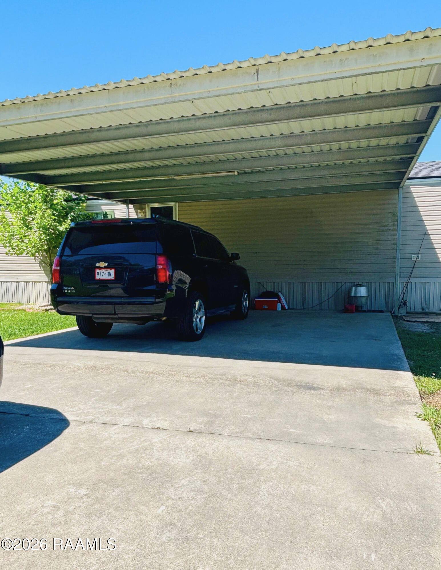 104 Gourmet Road Carencro, LA 70520 - Photo 6 of 13 Car port 1 - Edited