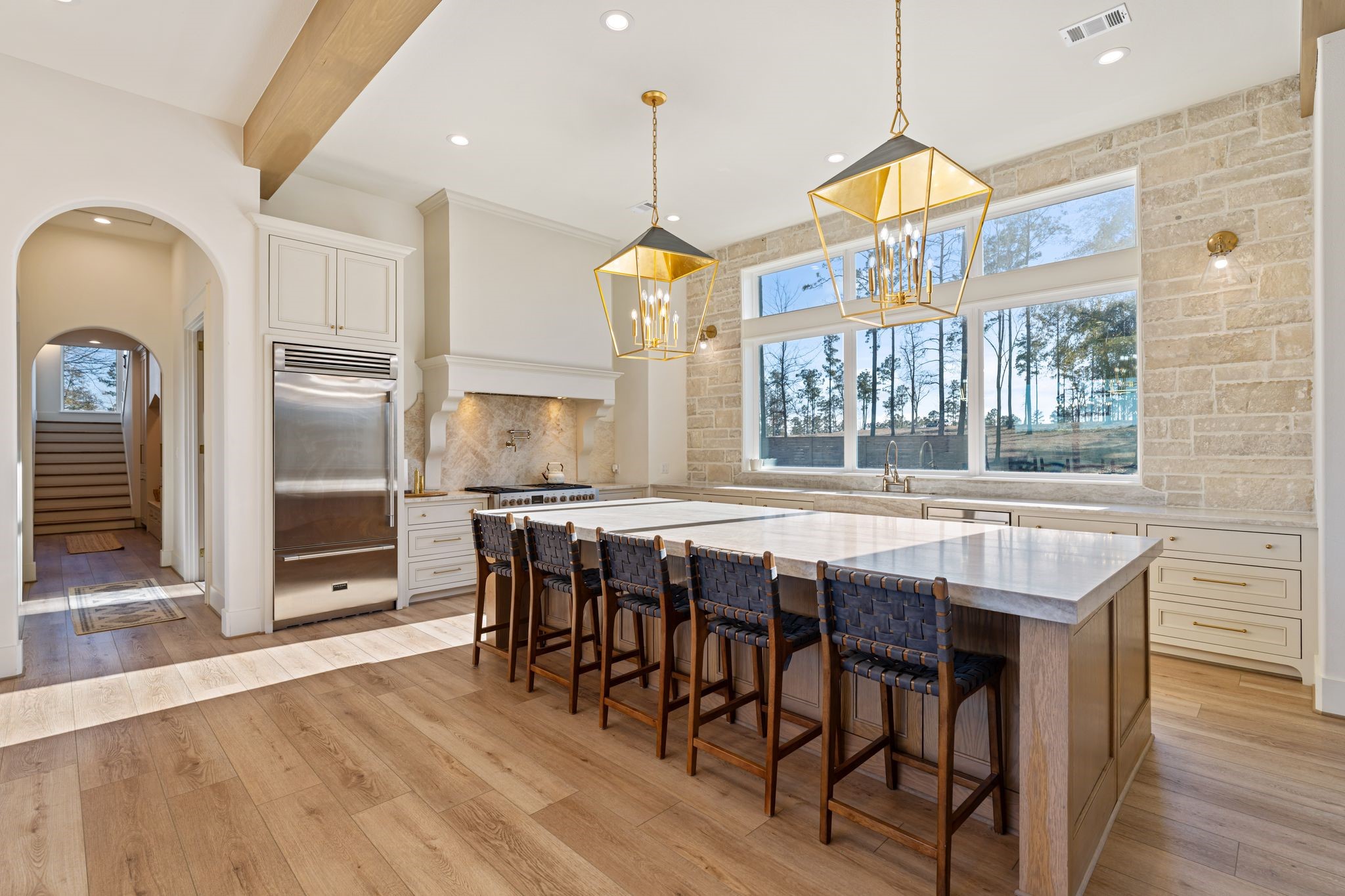 308 Western Road Livingston, TX 77351 - Photo 20 of 49 a dining room with wooden floor a chandelier a wooden table and chairs