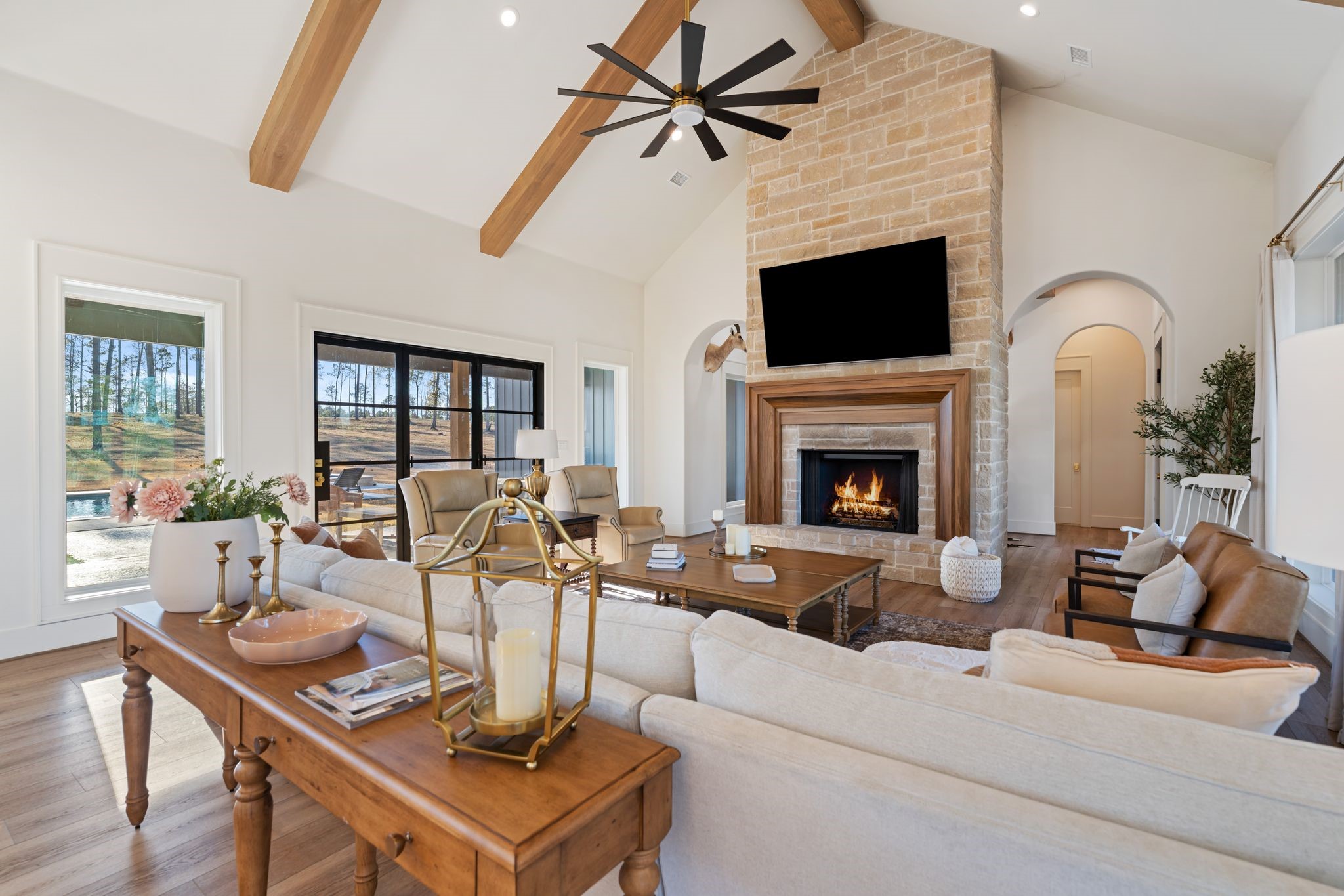 308 Western Road Livingston, TX 77351 - Photo 24 of 49 a living room with furniture a flat screen tv and a fireplace