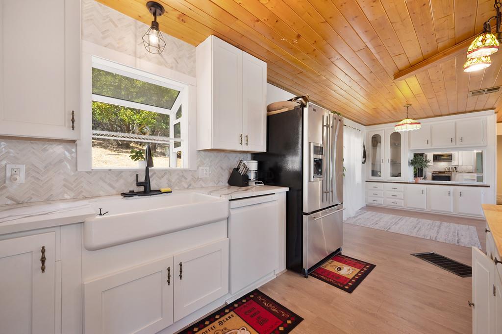 333 Pine Street Colfax, CA 95713 - Photo 12 of 65 a kitchen with a sink appliances and cabinets
