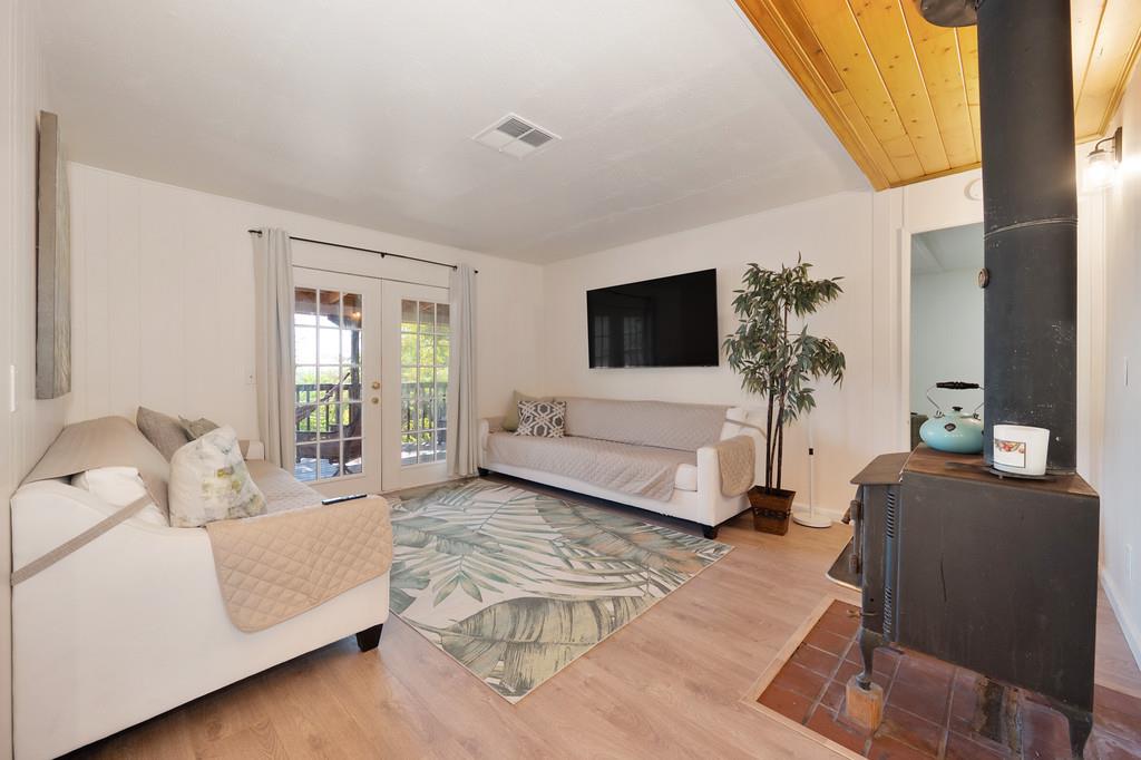 333 Pine Street Colfax, CA 95713 - Photo 13 of 65 a living room with furniture and a flat screen tv