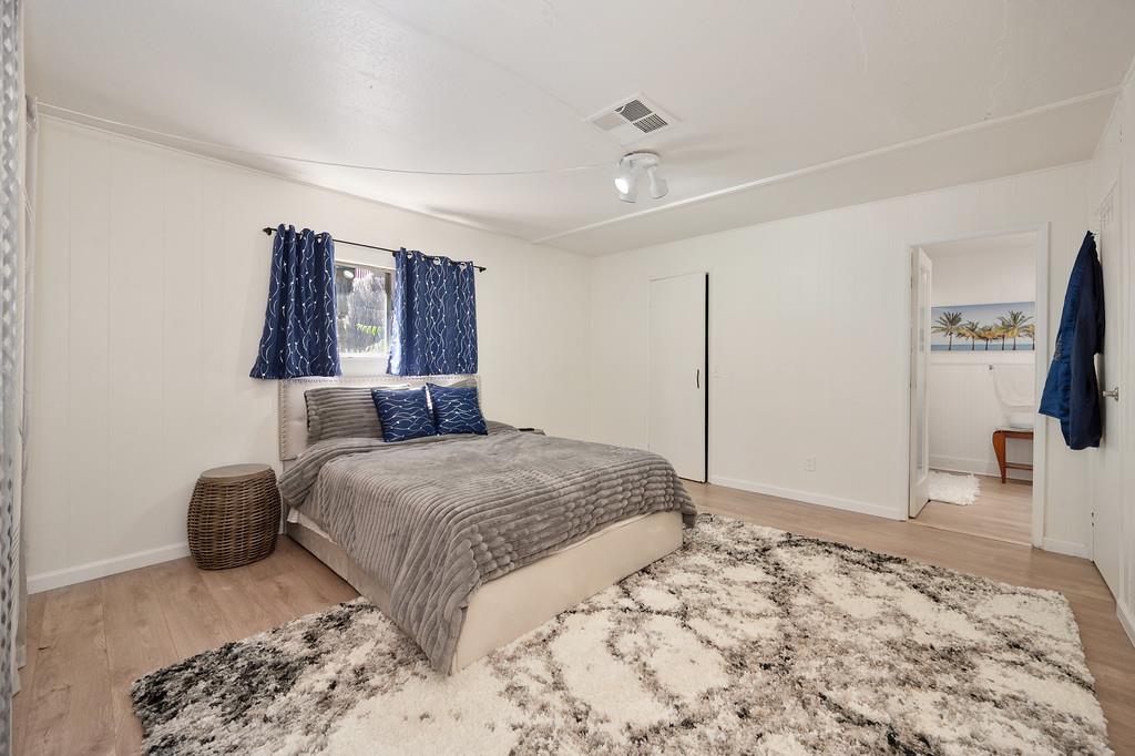 333 Pine Street Colfax, CA 95713 - Photo 16 of 65 a bedroom with a bed and a television