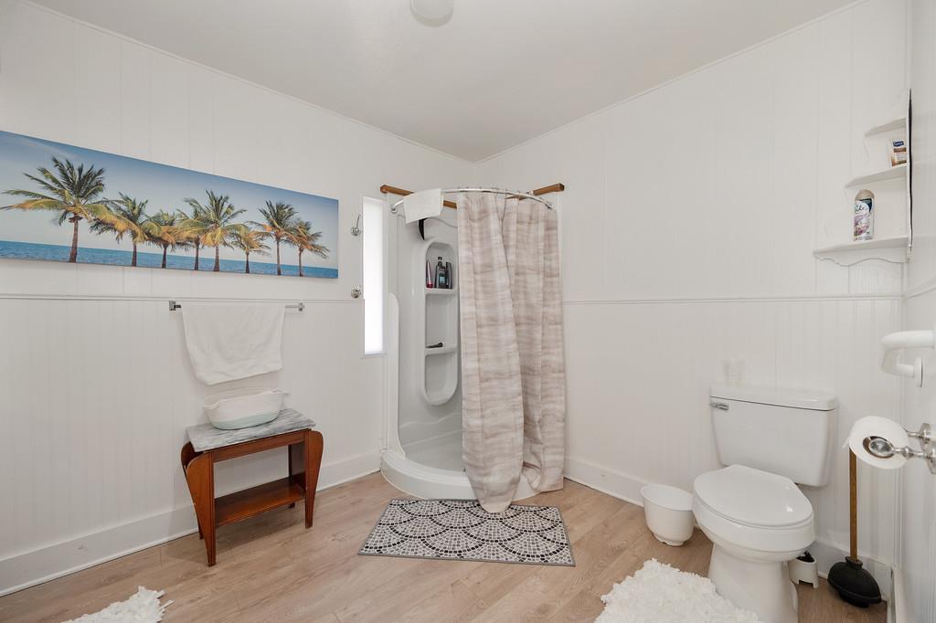333 Pine Street Colfax, CA 95713 - Photo 19 of 65 a bathroom with a toilet and a shower