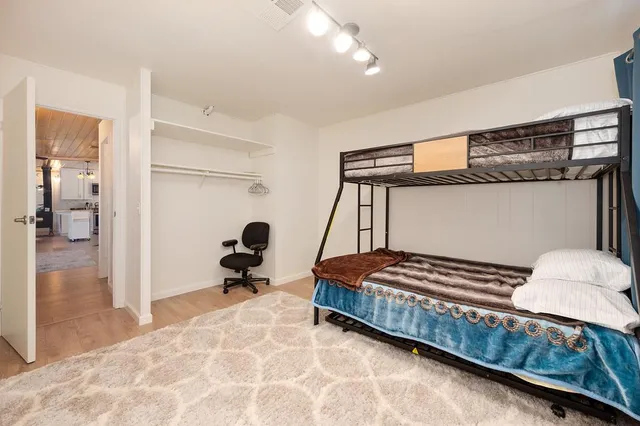 a view of balcony with wooden floor