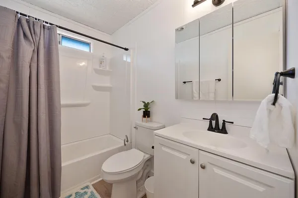 a view of a balcony with furniture