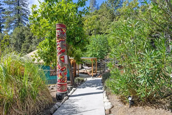 a backyard of a house with seating space