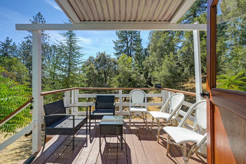 333 Pine Street Colfax, CA 95713 - Photo 38 of 65 a roof deck with chairs and wooden floor