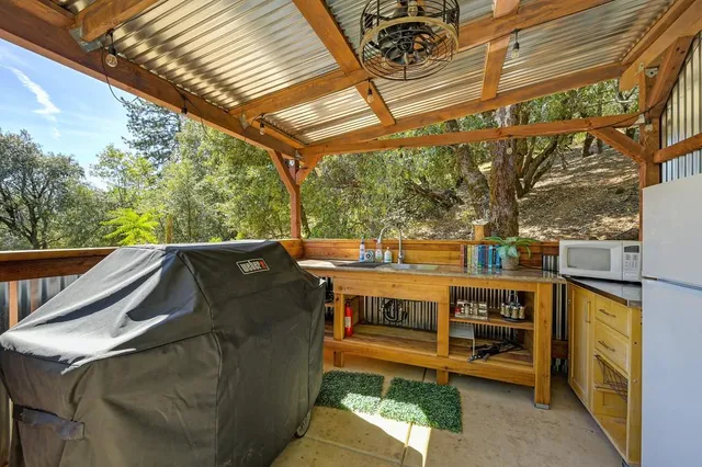 a utility room with a sink dryer and washer