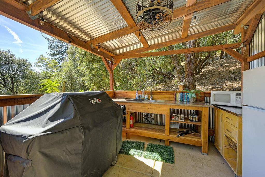 333 Pine Street Colfax, CA 95713 - Photo 43 of 65 a view of a chairs and table in the patio