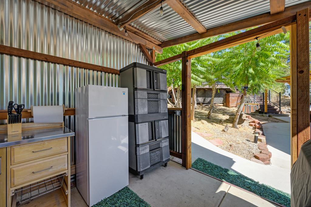 333 Pine Street Colfax, CA 95713 - Photo 44 of 65 a kitchen with a refrigerator and a sink