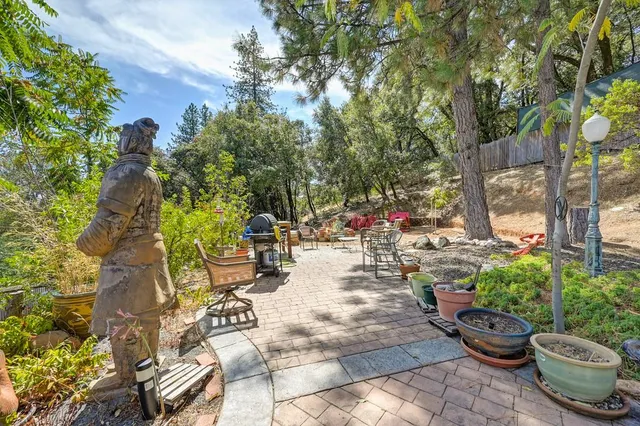 a view of a yard with an outdoor space