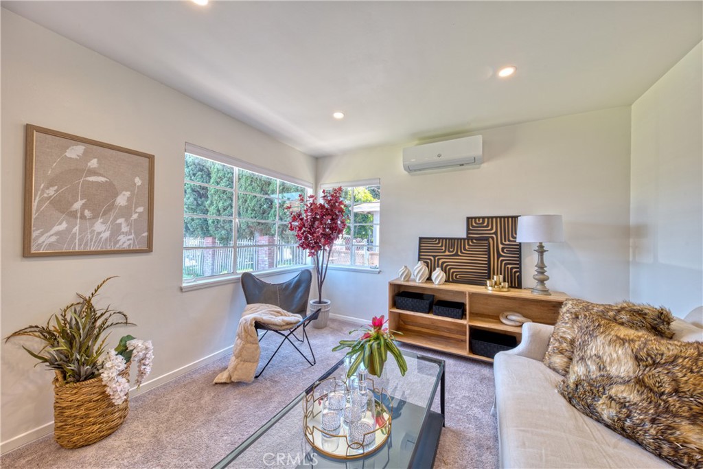 2531 Calmia Road Duarte, CA 91010 - Photo 9 of 30 a living room with furniture flowerpot and a window