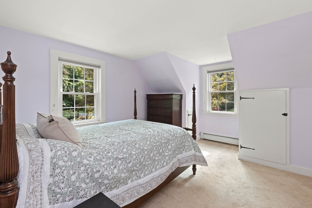 33 Bare Hill Road Topsfield, MA 01983 - Photo 16 of 40 a bedroom with a bed and a window