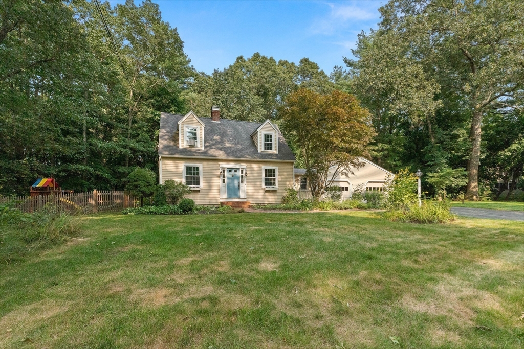 33 Bare Hill Road Topsfield, MA 01983 - Photo 35 of 40 a front view of a house with a yard