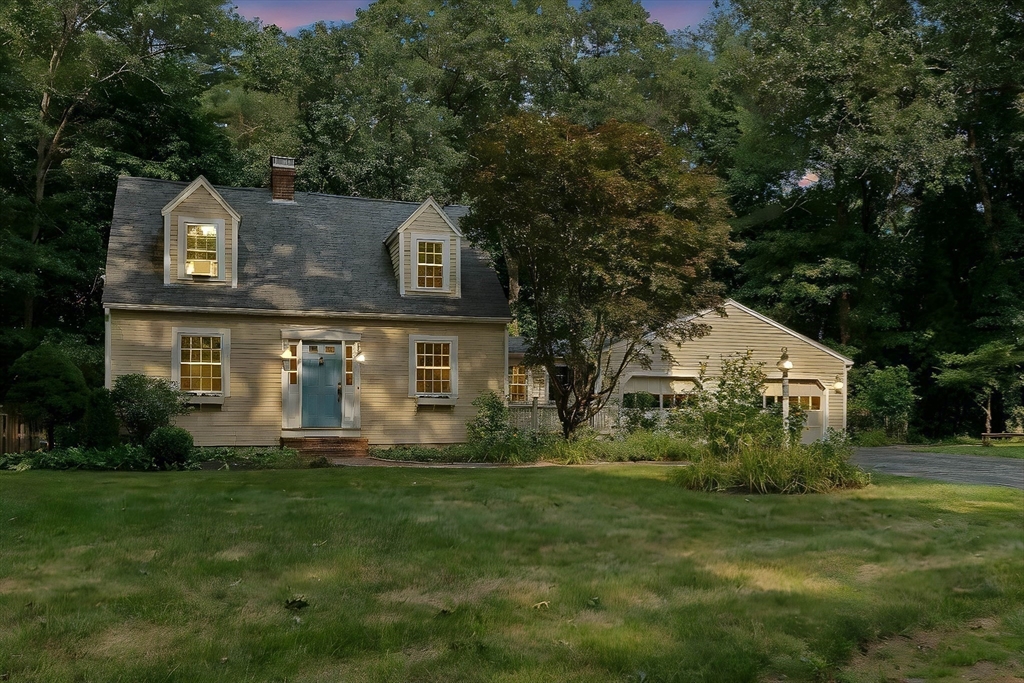 33 Bare Hill Road Topsfield, MA 01983 - Photo 37 of 40 a front view of house with a garden