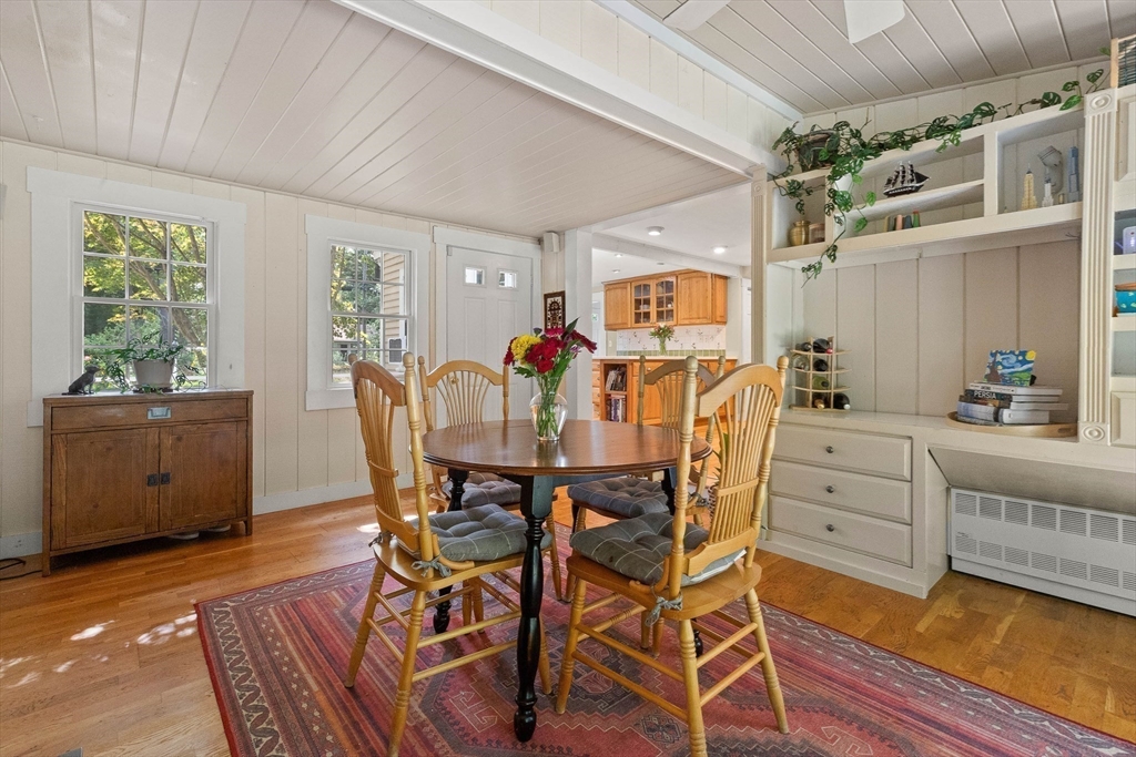 33 Bare Hill Road Topsfield, MA 01983 - Photo 4 of 40 a view of a dining room with furniture and wooden floor