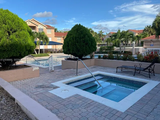 a view of a terrace with sitting area
