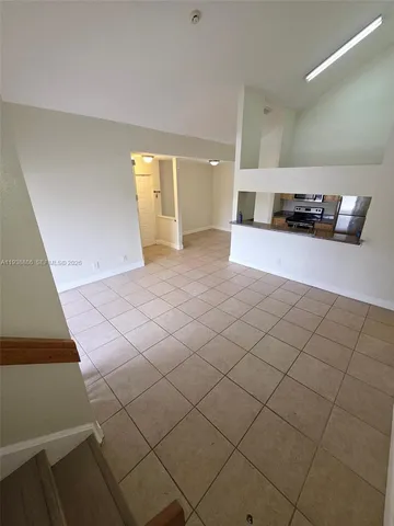 a view of kitchen and windows