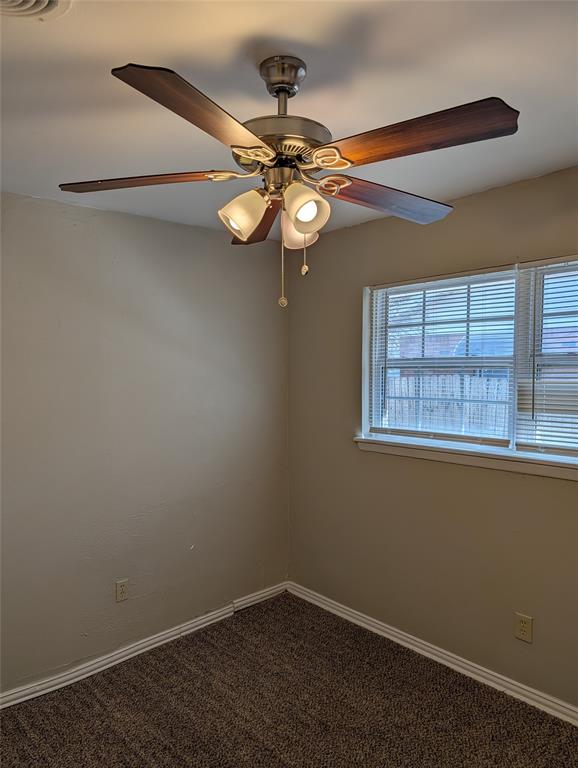 5521 Odessa Avenue Fort Worth, TX 76133 - Photo 14 of 21 a view of an empty room with a window