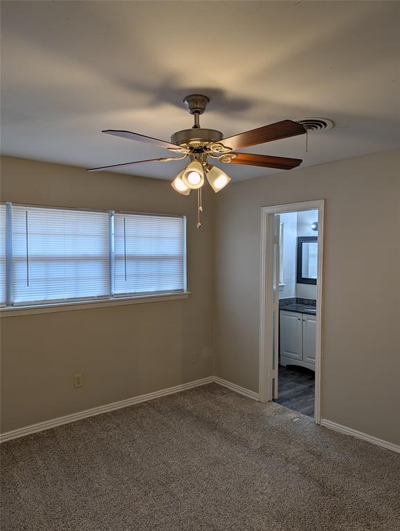 5521 Odessa Avenue Fort Worth, TX 76133 - Photo 18 of 21 a view of an empty room with a window