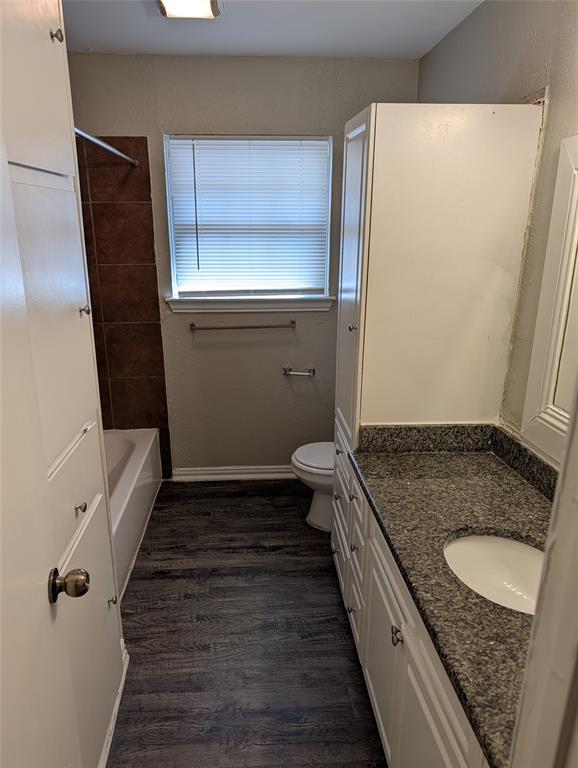 5521 Odessa Avenue Fort Worth, TX 76133 - Photo 20 of 21 a bathroom with a granite countertop sink and a granite counter top