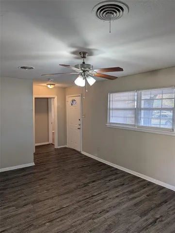 a view of a livingroom with a window