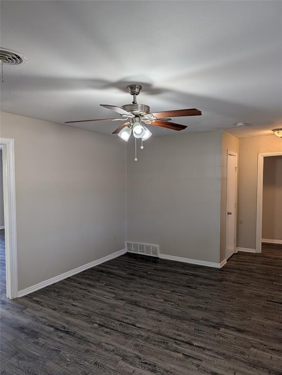 5521 Odessa Avenue Fort Worth, TX 76133 - Photo 5 of 21 a view of a room with wooden floor