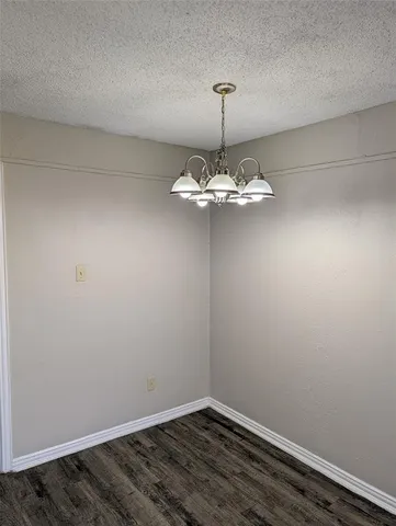 a view of a chandelier in a room