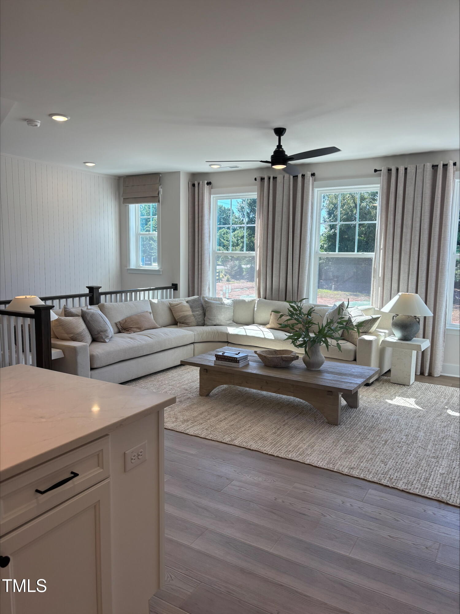 10901 Bayflower Way Raleigh, NC 27617 - Photo 9 of 12 a living room with furniture and a large window