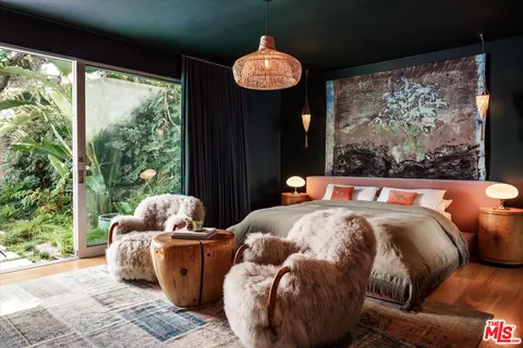 a view of a porch and garden