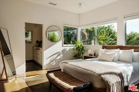 a bathroom with a sink and a window