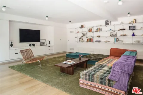 a view of a chairs and table in a yard