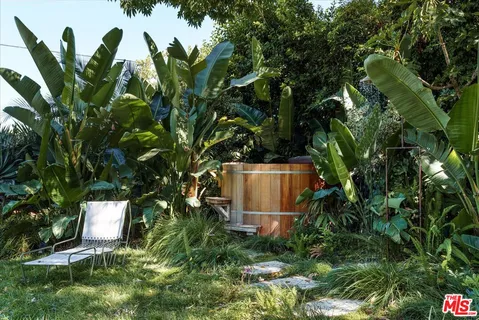 a garden view with a seating space