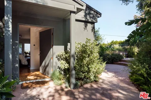a living room with furniture and view of living room