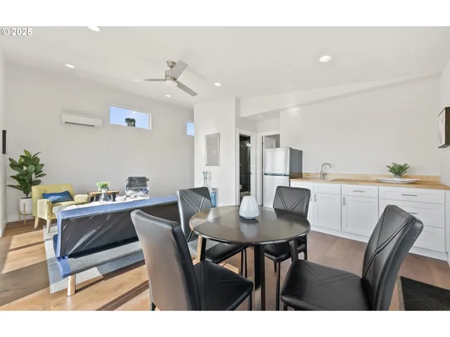 a view of a dining room with furniture
