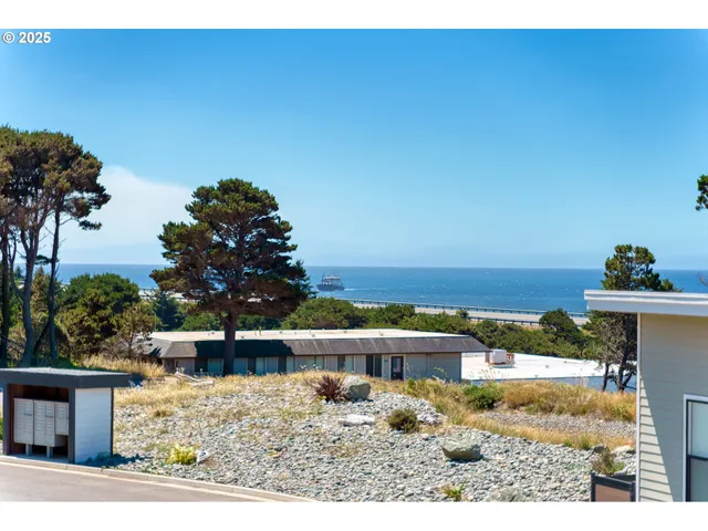 a view of residential houses with outdoor space