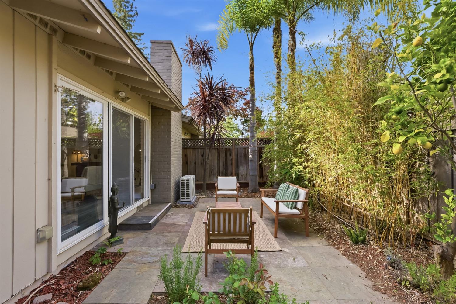 672 North San Antonio Road Los Altos, CA 94022 - Photo 9 of 22 a view of a patio with table and chairs and potted plants