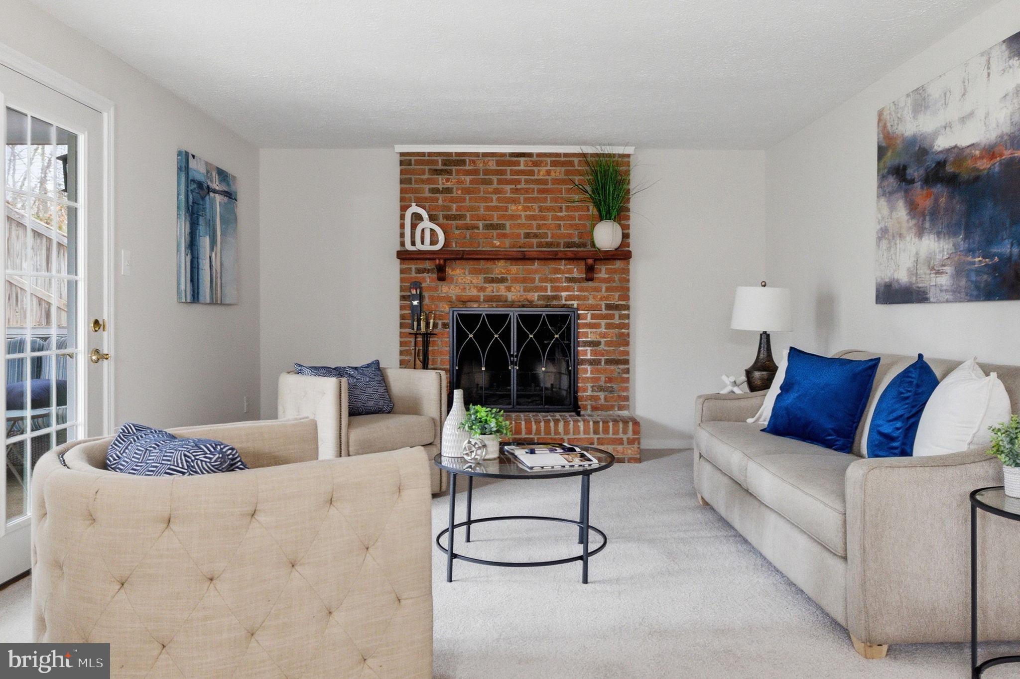 5755 Heming Avenue Springfield, VA 22151 - Photo 27 of 71 a living room with furniture and a fireplace