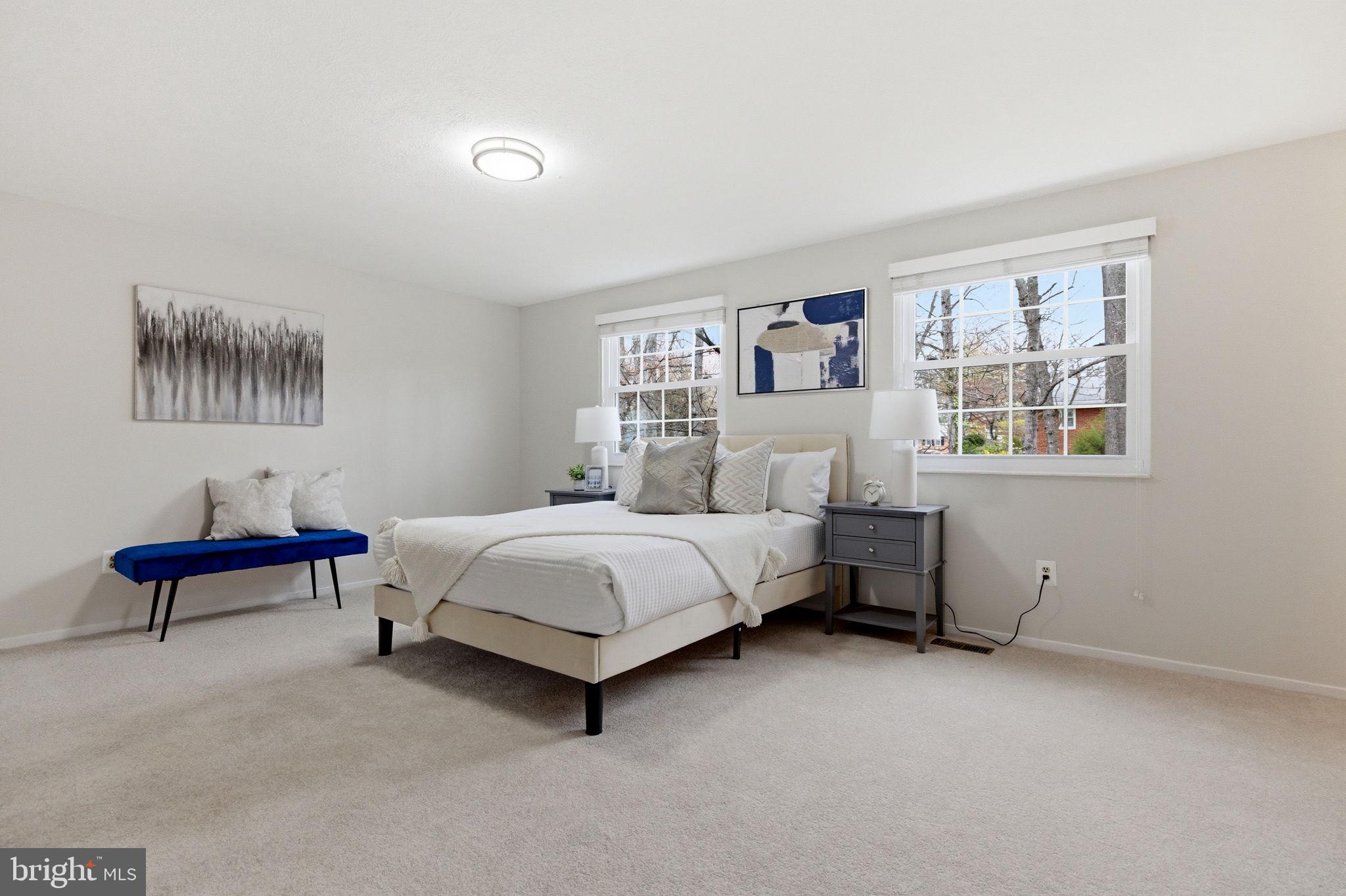 5755 Heming Avenue Springfield, VA 22151 - Photo 35 of 71 a bedroom with a bed and a wall painting