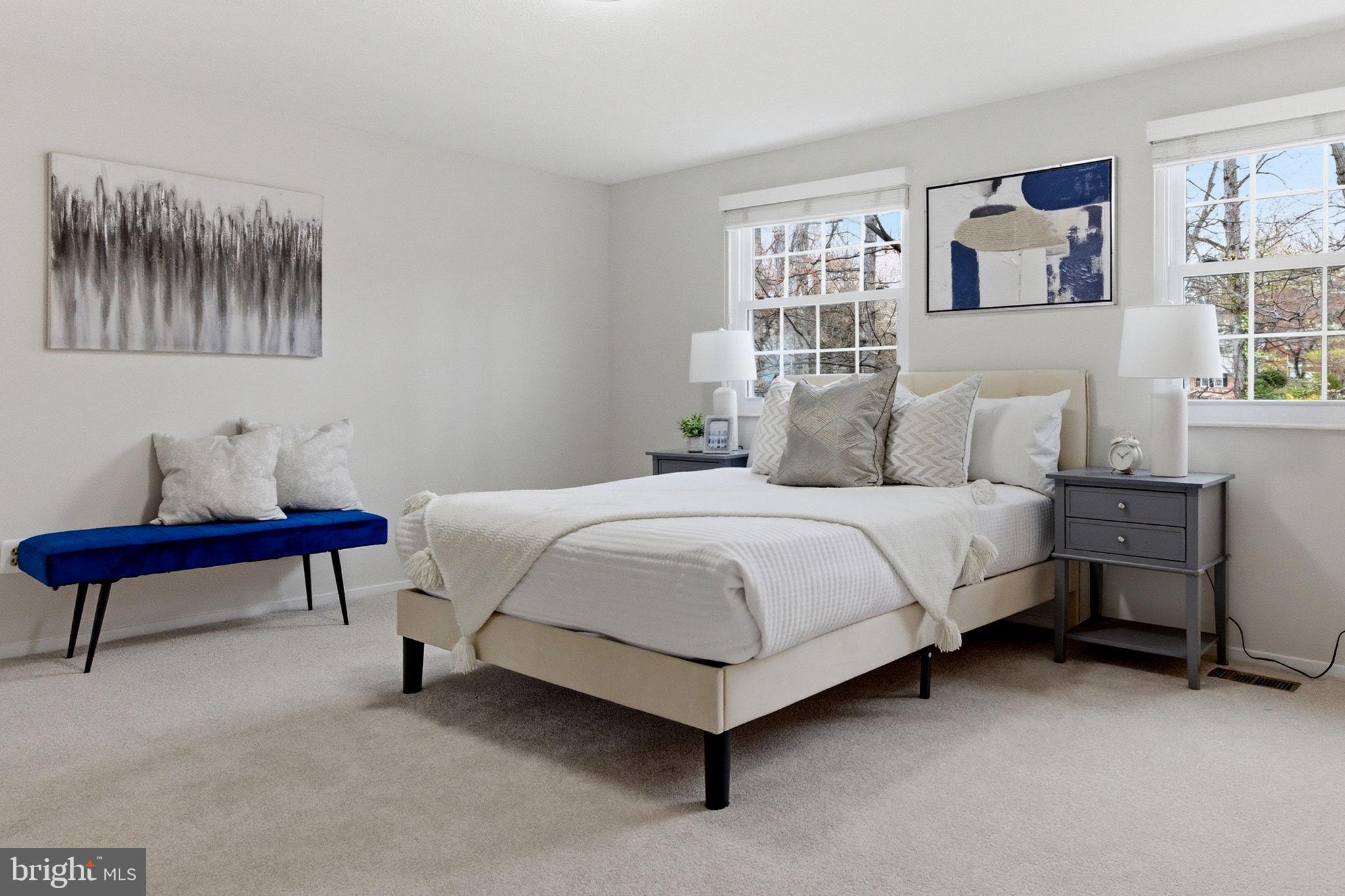 5755 Heming Avenue Springfield, VA 22151 - Photo 36 of 71 a bedroom with a bed and a couch