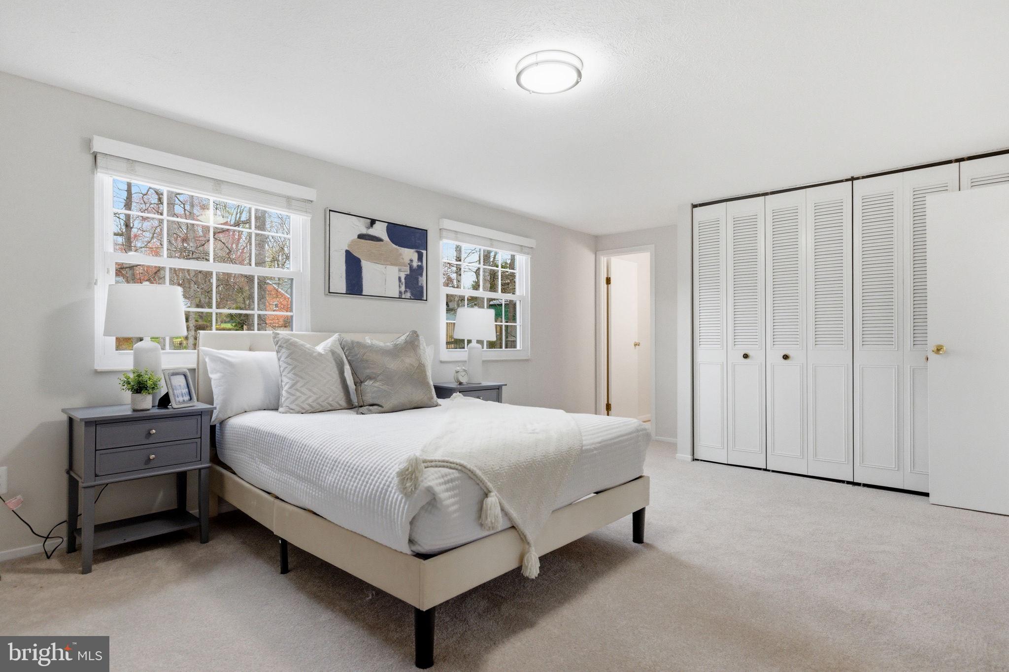 5755 Heming Avenue Springfield, VA 22151 - Photo 37 of 71 a bedroom with a bed table and window