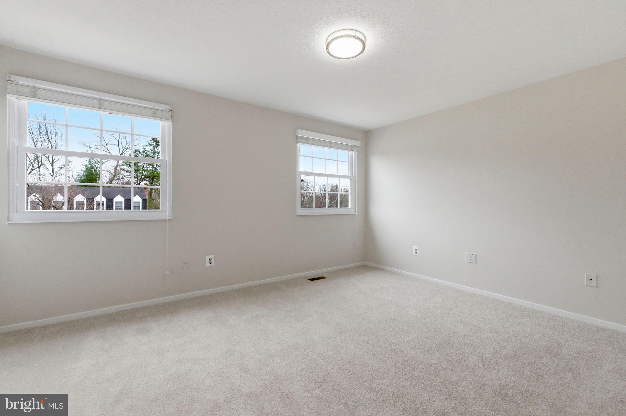 5755 Heming Avenue Springfield, VA 22151 - Photo 44 of 71 an empty room with windows