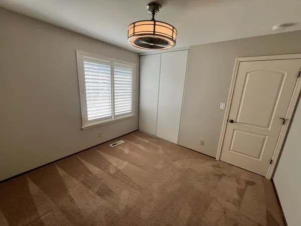 a view of a livingroom with a window