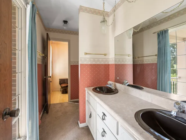 a view of a room with a furniture