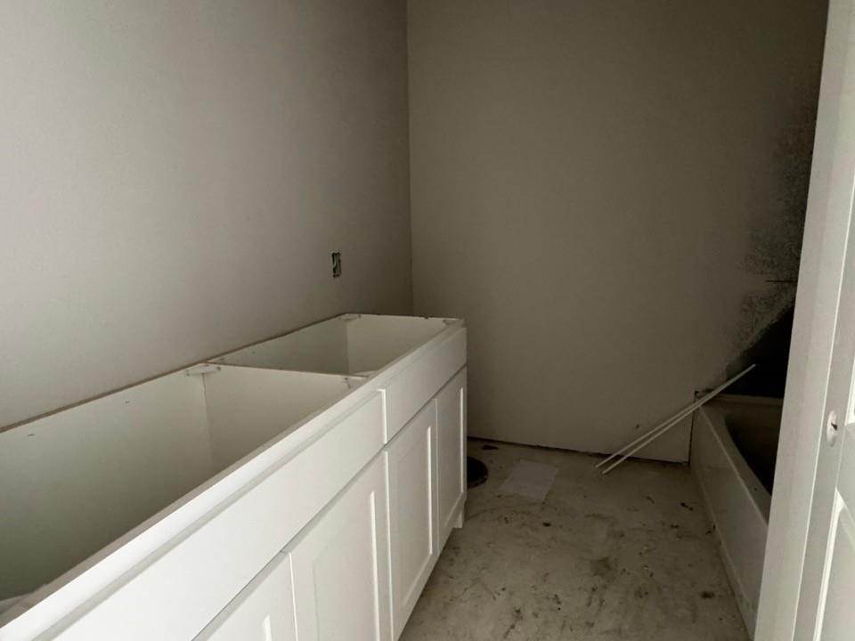 2305 Quartz Street Krum, TX 76249 - Photo 17 of 18 a utility room with dryer and washer