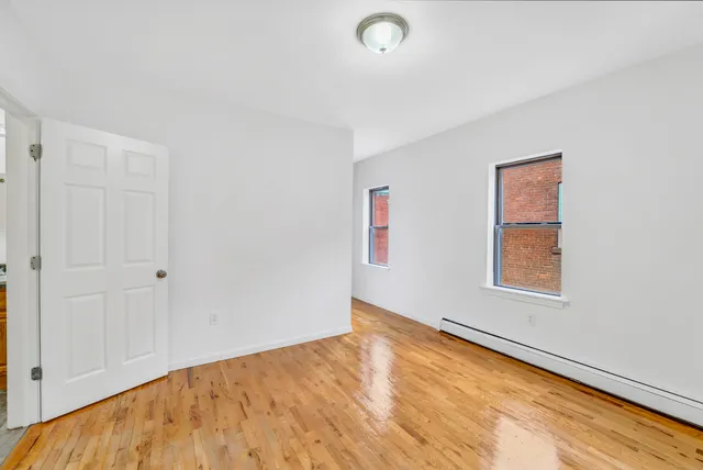 a view of an empty room and window