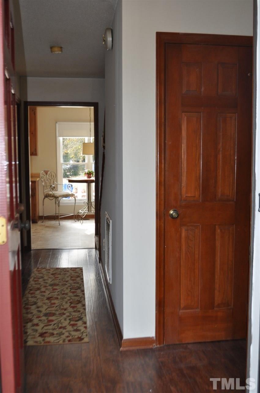 13465 Cleveland Road Garner, NC 27529 - Photo 4 of 30 Foyer has newer laminate hardwood floors