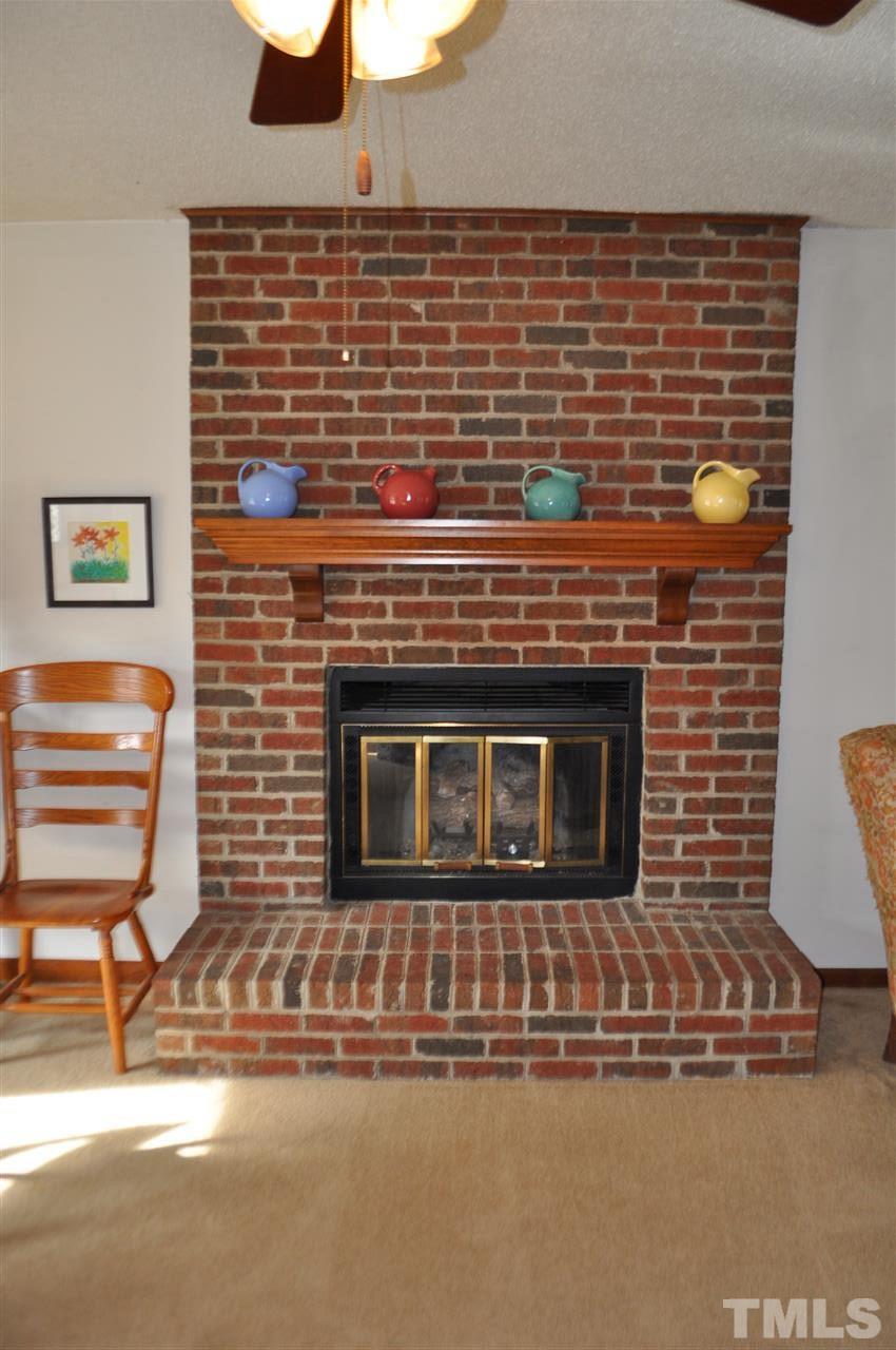 13465 Cleveland Road Garner, NC 27529 - Photo 9 of 30 Gorgeous and RARE real wood burning fireplace. Currently has gas log insert.